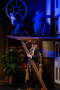 Theatrical performance with three actors on a