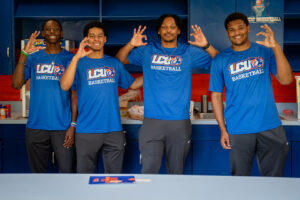 Four smiling young men in LCU Basketball