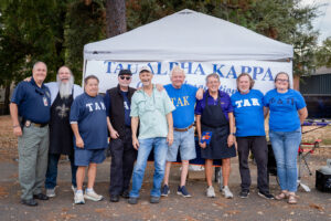 Smiling group at a Tau Alpha Kappa event