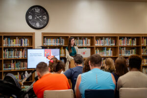 Woman presents on The Importance of Good