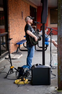 Man playing acoustic guitar and singing