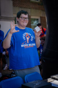 Smiling person in a blue