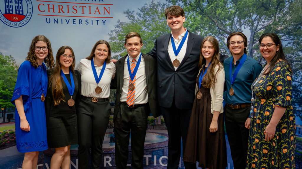 Group of students with awards at the C.S. Lewis Honor Program.